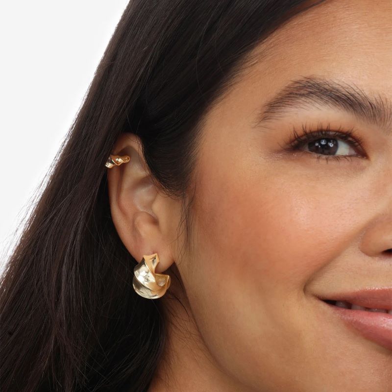 melinda maria gold with a twist hoop earring